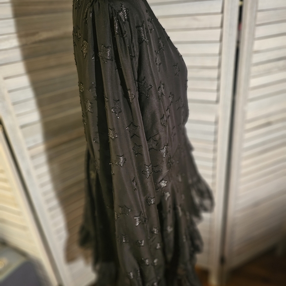 Torrid Black long wrap blouse with star print. - Picture 4 of 9